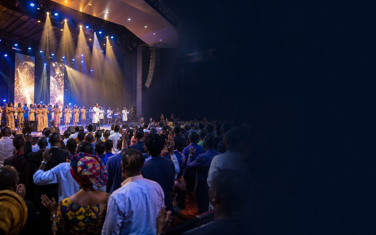 Nigerian gospel worship conference with raised voices