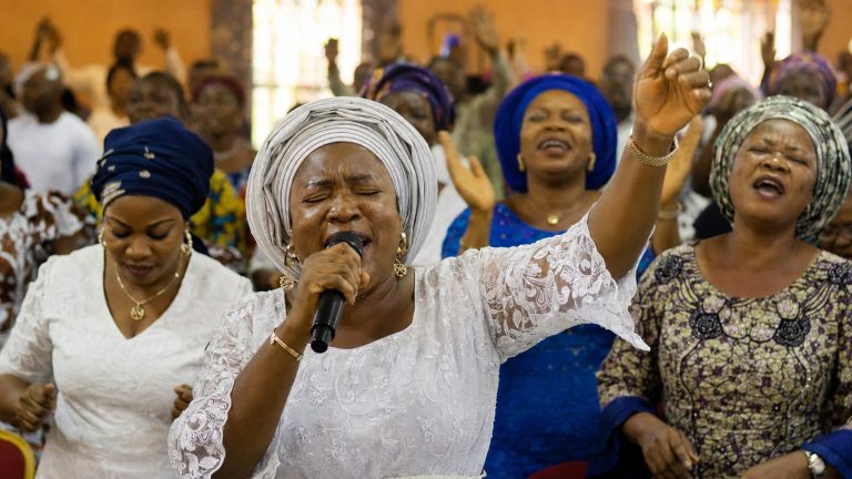 Nigerian gospel worshippers lifting their voices together