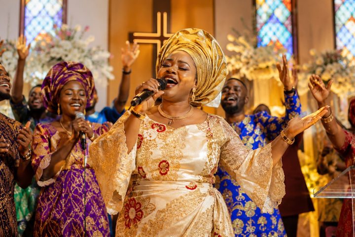 Nigerian gospel worship in vibrant church attire